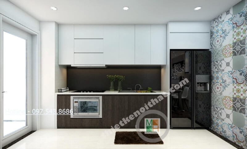 Chỉ với 2 tone màu trắng và nâu trầm đóng vai trò chủ đạo, không gian phòng bếp thêm phần đẹp mắt, sang trọng và rộng thoáng Tủ bếp gỗ công nghiệp
