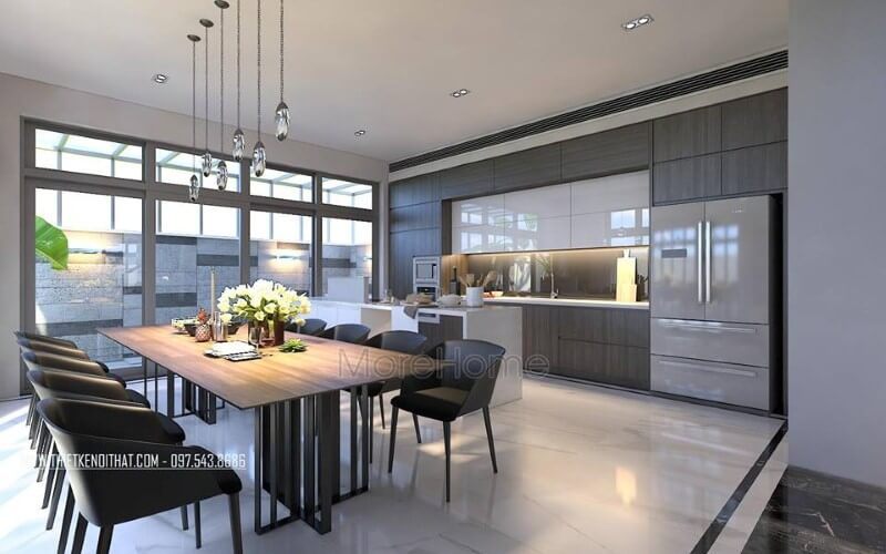 Bộ bàn ghế ăn, đèn thả, tủ bếp acrylic, laminate đã tạo nên một phong cách đẹp mắt, độc đáo cho phòng ăn liền bếp.